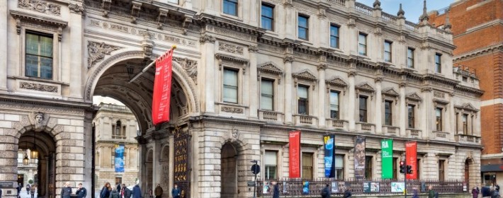 exterior of burlington house with arched entrance